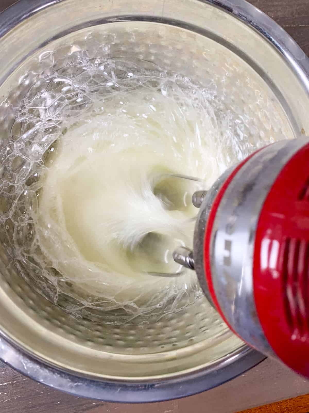 beating the egg whites in a clean bowl.