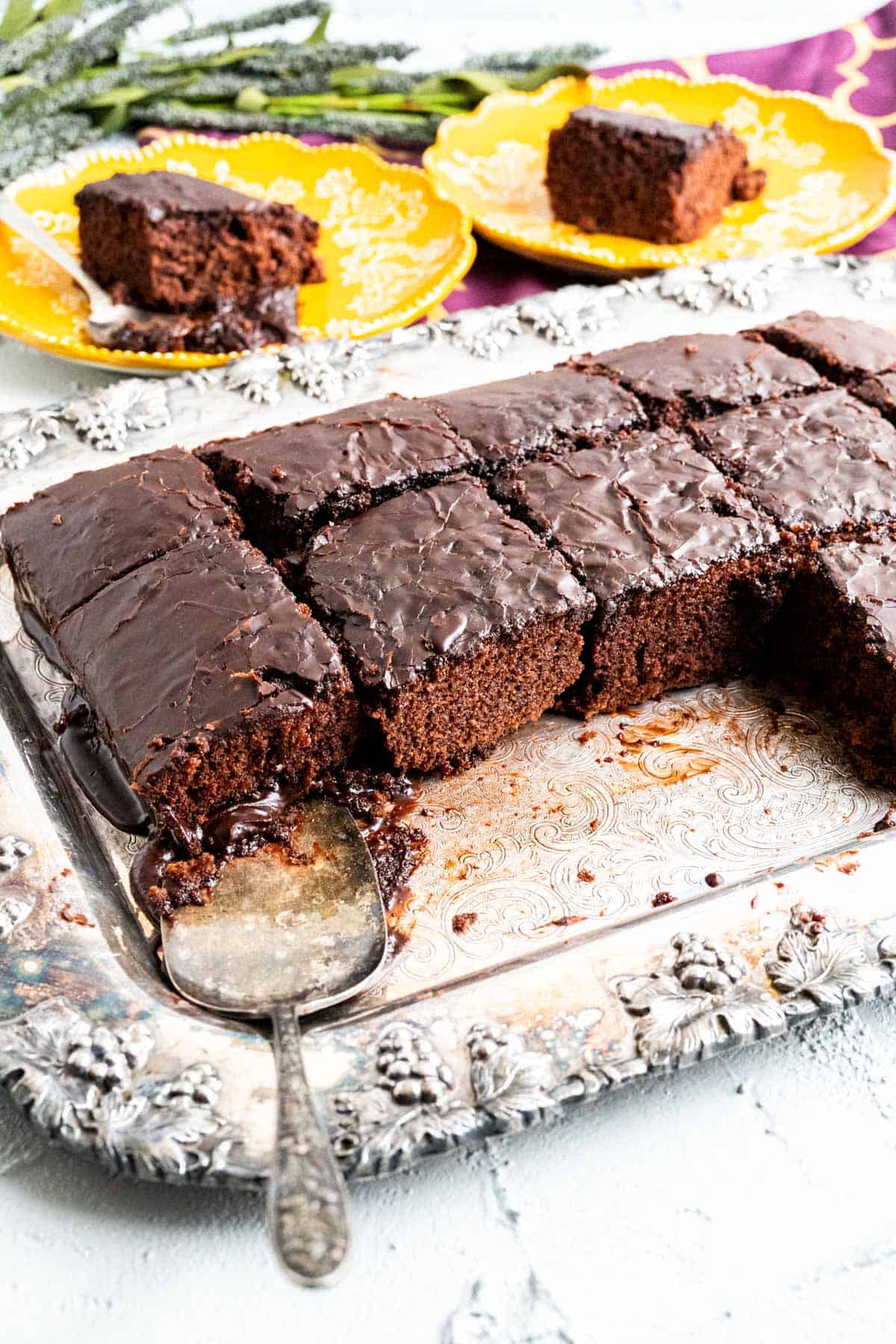 classic coca cola cake with a silver spoon in the tray.
