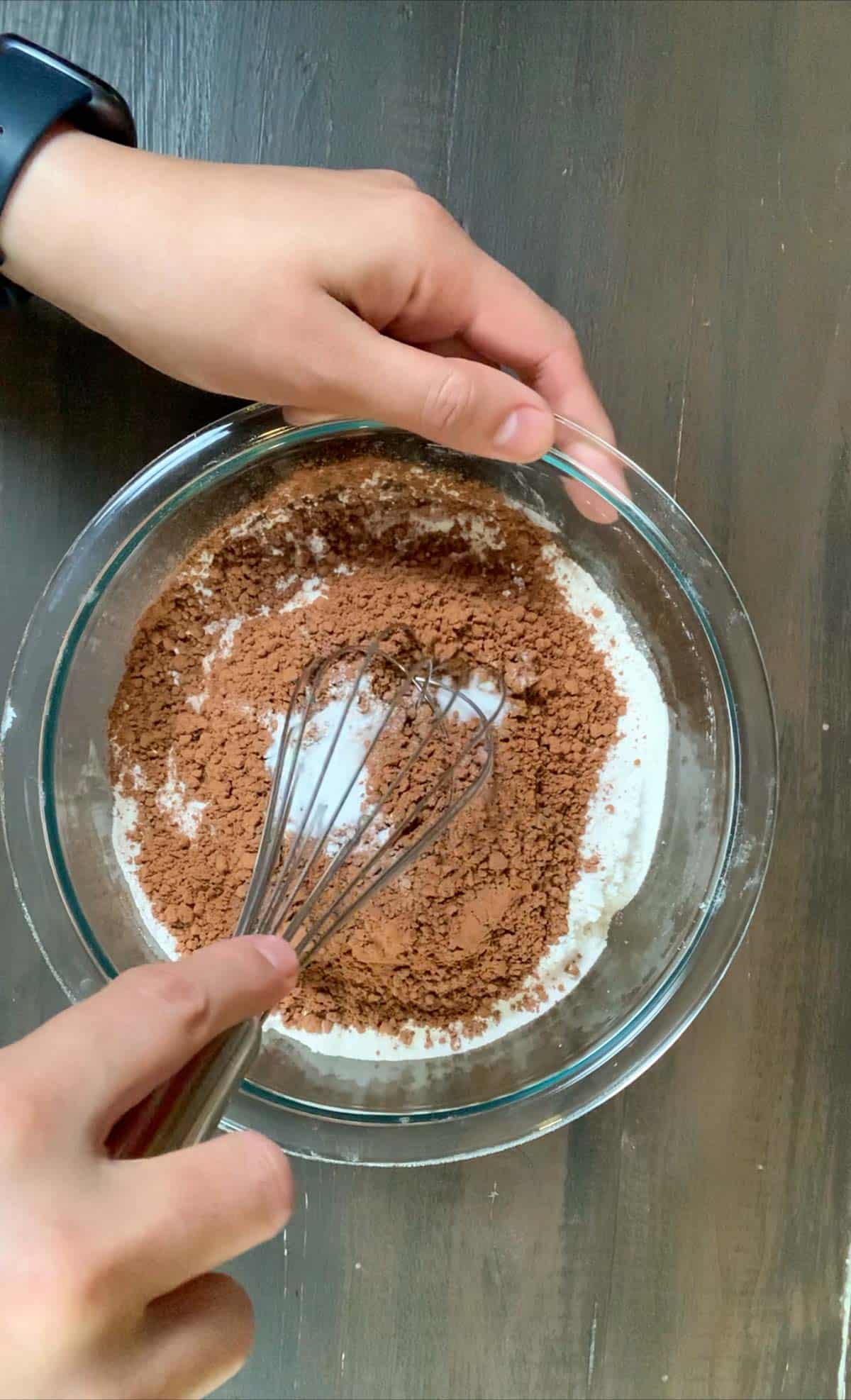 dry ingredients of chocolate sour cream pound cake in a bowl.