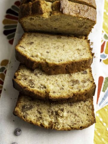closeup shot of banana bread slices showcasing the texture and crumb of the bread.