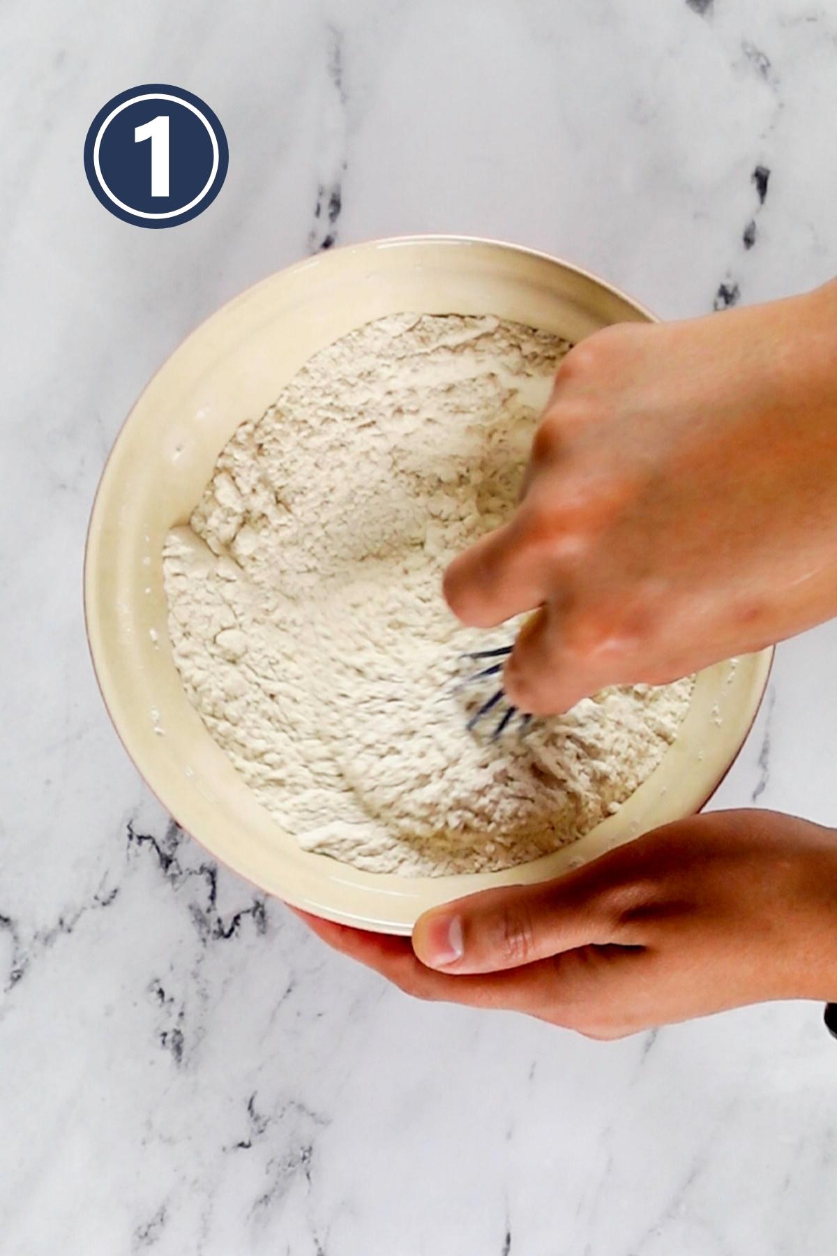 whisking the all purpose flour, salt and baking soda in a medium sized bowl.