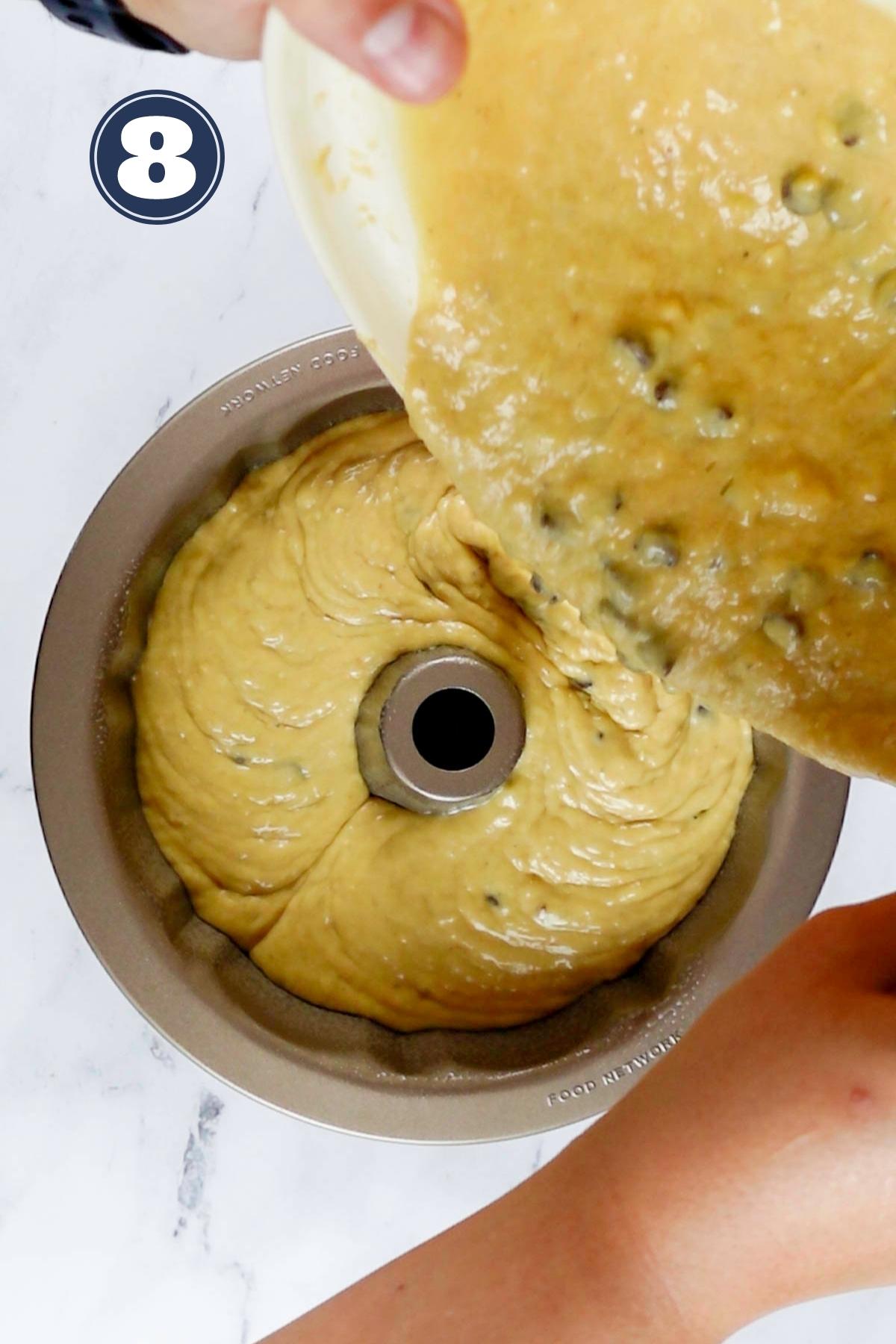 pouring the banana chocolate chip cake batter in the bundt pan.