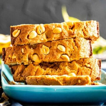 overlapped slices of quick bread with peanuts sprinkled on the top.